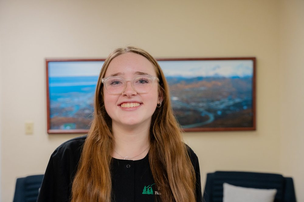 Dental Assistant Ava Beecroft, smiling in the Eagle View Family Dental office.