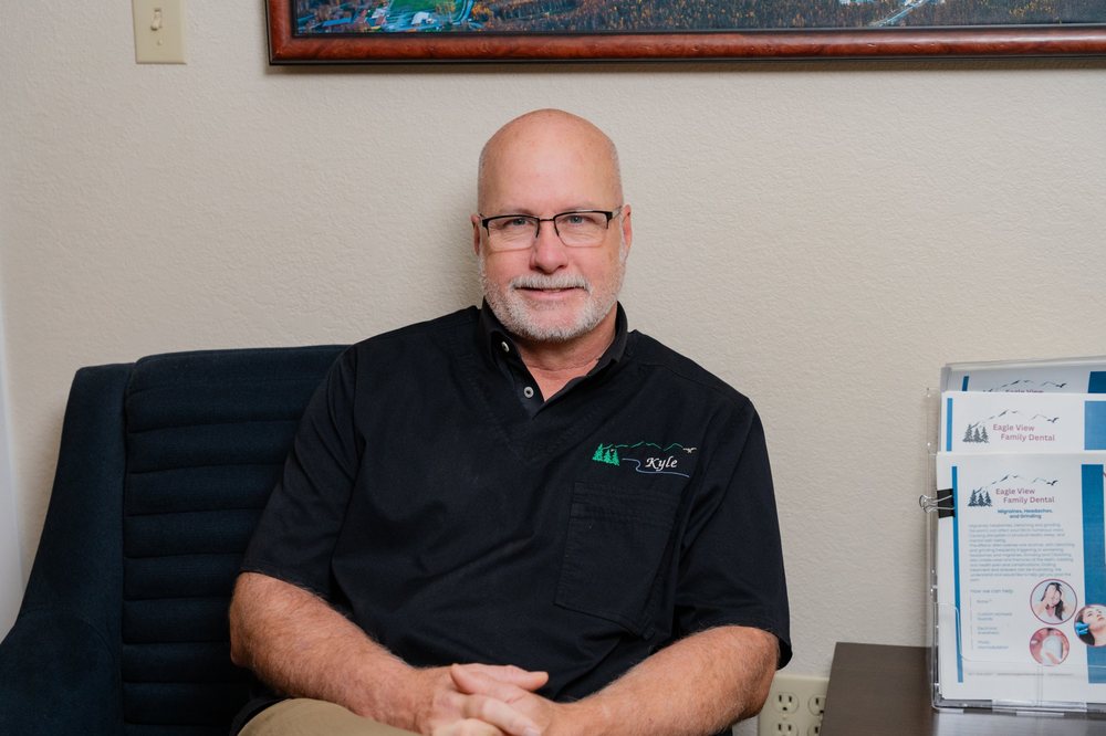 Kyle Curtis, smiling in the Eagle View Family Dental office.