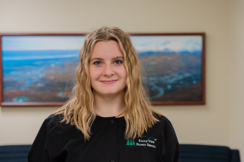 Dental Assistant Taliah Glausser, smiling in the Eagle View Family Dental office.